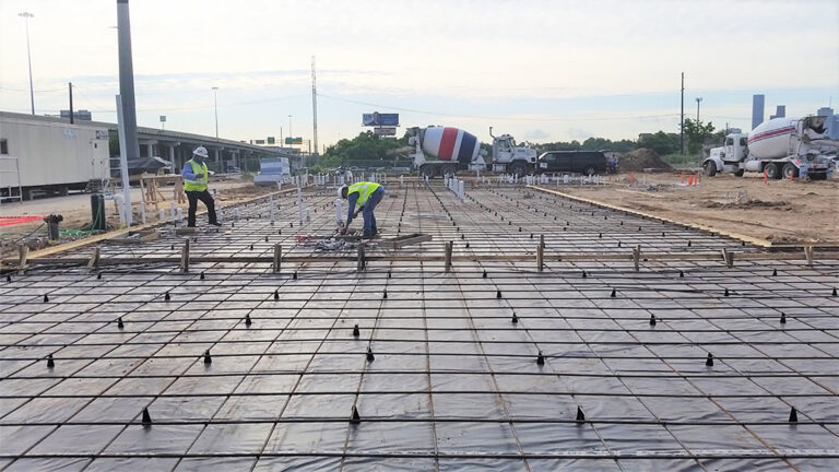 LA Fitness Center Houston TX - workers preparing rebar grid for a slab pour during construction, Keeton Construction Services