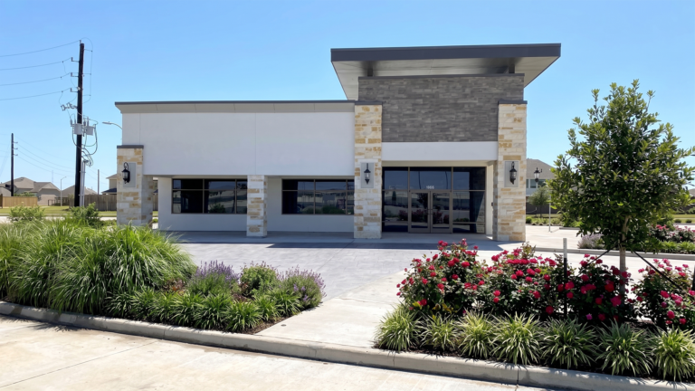 Exterior view of a standalone building at Bella Piazza Retail Center with landscaping, Richmond, TX - Keeton Construction Services