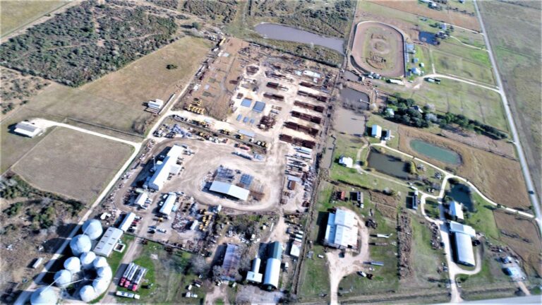 High aerial overview of the Alpine Site Services site and surrounding area in Edna, TX, by Keeton Construction Services, showing the full site extent