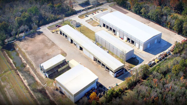 Aerial view of the Master Rig International facility in Houston, TX built by Keeton Construction Services showing multiple metal buildings and paved areas