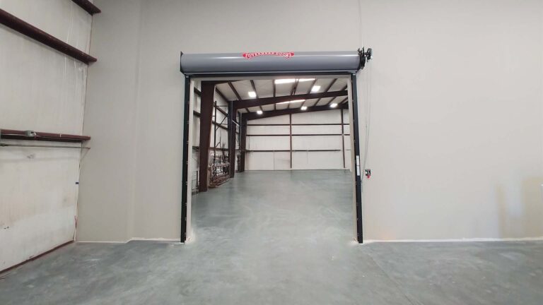 Precision Piping Products interior view through open overhead door in Houston TX by Keeton Construction Services