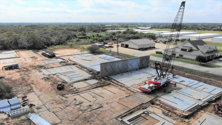 Park 723 Office/Warehouse Flex Space in Rosenberg, TX - aerial view of the site during construction with a crane visible, by Keeton Construction Services