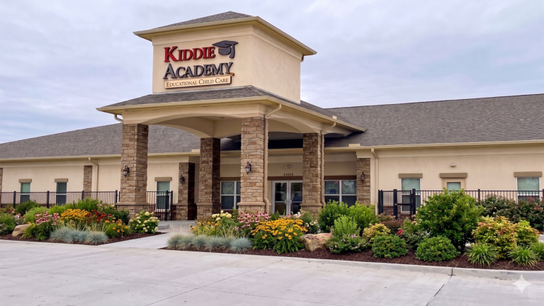 Kiddie Academy Child Care Mueschke by Keeton Construction Services - front entrance with signage, covered entry, and landscaping, Cypress, TX