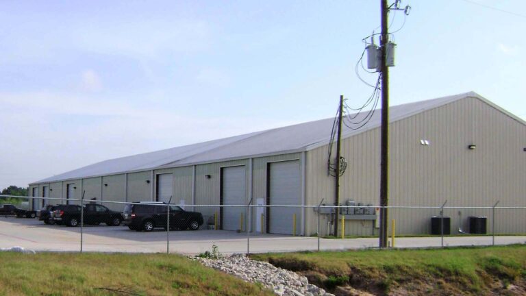 Mueschke Retail and Business Park in Cypress TX - metal building with overhead doors and parking area, built by Keeton Construction Services