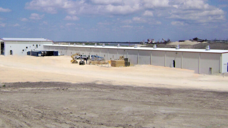 Helix Energy Solutions Spool Base in Ingleside, TX - row of metal buildings with equipment on site, by Keeton Construction Services