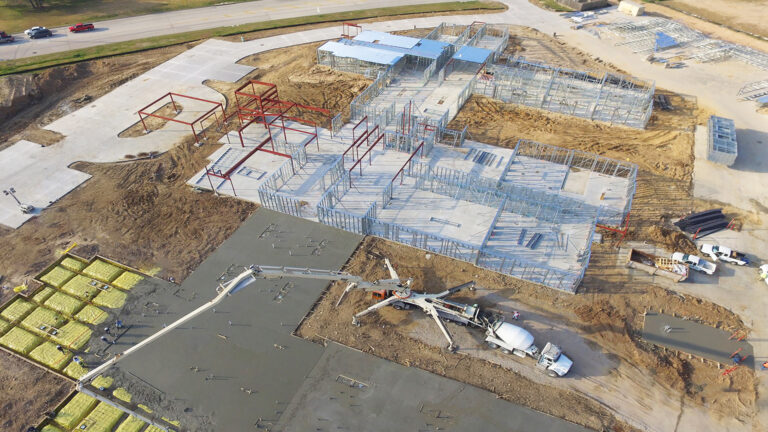 Aerial view of Legacy Business Park in Cypress TX during construction showing structural framing and active concrete work by Keeton Construction Services