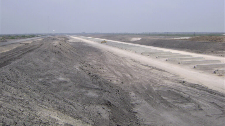 Helix Energy Solutions Spool Base in Ingleside, TX - site earthwork showing graded ground and placed concrete elements, by Keeton Construction Services