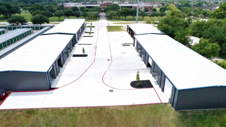 Aerial view of Legacy Business Park in Cypress TX showing two rows of metal buildings and a paved drive aisle by Keeton Construction Services