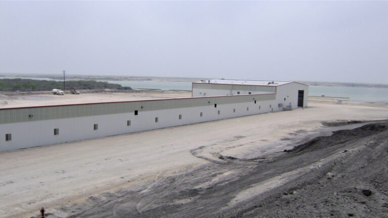 Helix Energy Solutions Spool Base in Ingleside, TX - exterior of a metal building along the waterfront, by Keeton Construction Services
