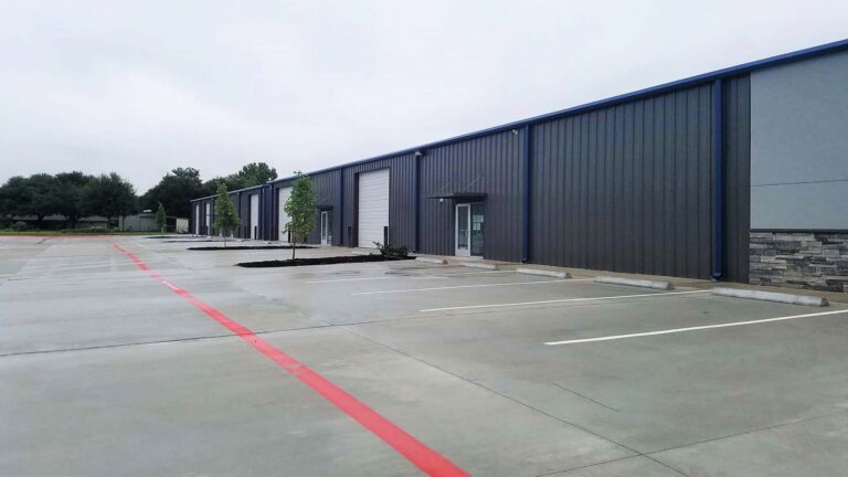 Metal building exterior and parking area at Legacy Business Park in Cypress TX by Keeton Construction Services