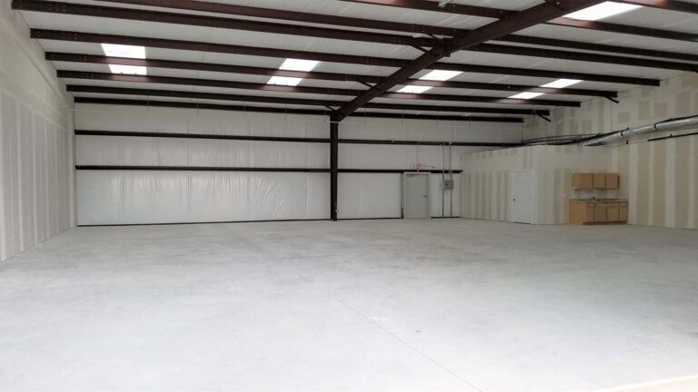Interior of a warehouse bay at Legacy Business Park in Cypress TX showing exposed steel framing by Keeton Construction Services