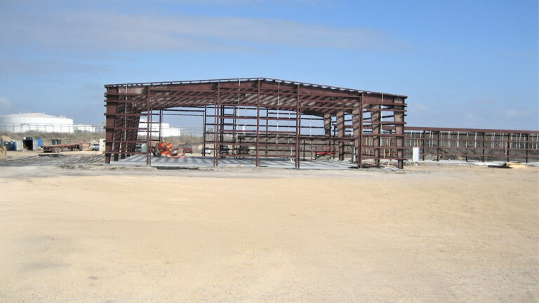 Helix Energy Solutions Spool Base in Ingleside, TX - bare structural steel frame during construction on a graded site, by Keeton Construction Services