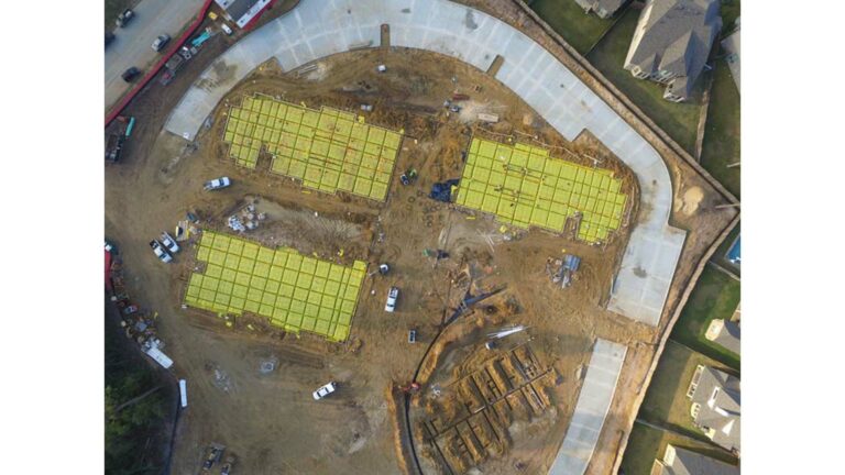 Aerial view of Avanti Senior Living construction site in Spring, TX during foundation work by Keeton Construction Services