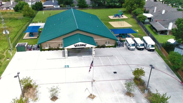 Aerial view of Kids World Learning Center in Houston TX built by Keeton Construction Services, showing the building, parking lot, and playground areas