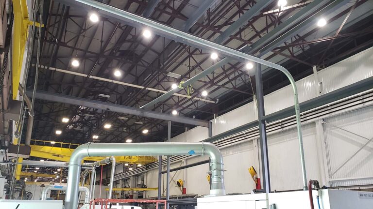 Interior of the Labatt Food Service warehouse in Houston, TX showing roof structure and overhead ductwork, Keeton Construction Services