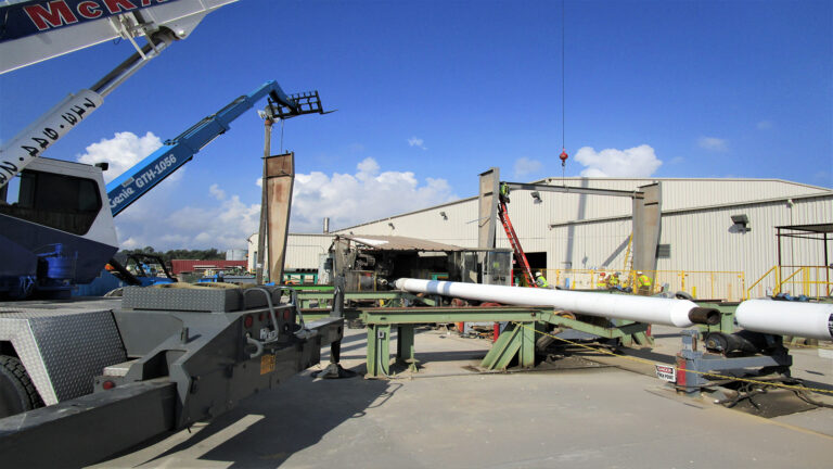 Socotherm Gulf of Mexico in Channelview, TX - heavy equipment and large pipe on rollers in an active industrial yard, Keeton Construction Services