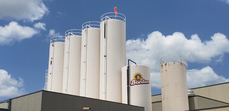 Borden Dairy silos in Houston, TX with Borden logo visible, Keeton Construction Services project