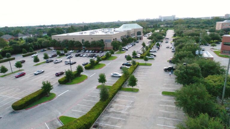 Aerial view of the Lifetime Fitness parking lot and building exterior in Sugarland, TX, a project by Keeton Construction Services