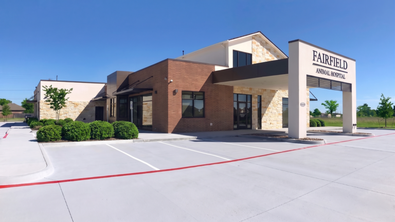 Exterior of Fairfield Animal Hospital in Cypress, TX built by Keeton Construction Services, showing the building and parking area
