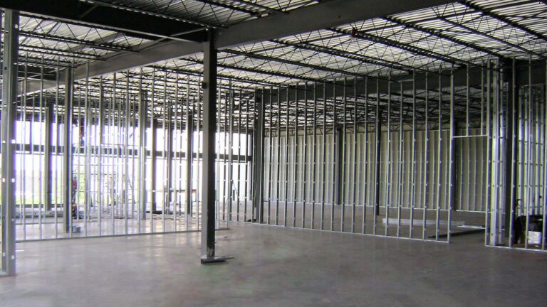 Interior framing during construction at Jakes Finer Foods in Houston, TX by Keeton Construction Services, showing metal stud wall framing