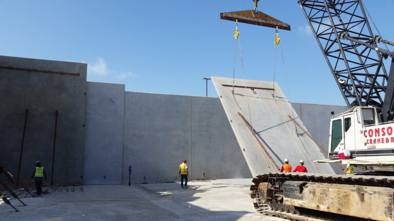 LA Fitness Center Houston TX - crane lifting a large concrete panel during construction, Keeton Construction Services