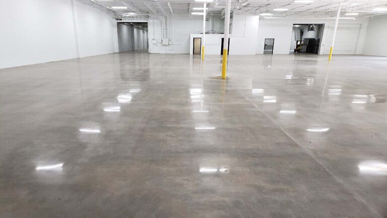 Ewald Kubota Equipment Dealership Houston TX - large open interior floor area with support columns, by Keeton Construction Services