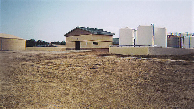 Shell Oil Refinery, Pasadena, TX - a masonry building and storage tanks at the site, by Keeton Construction Services