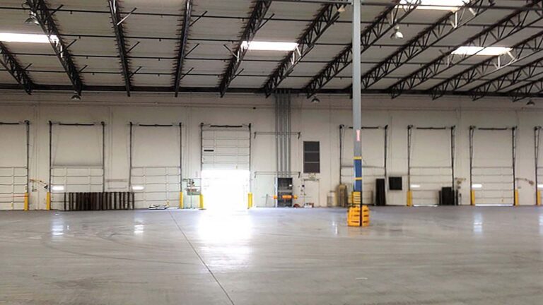Third Coast Produce in Houston, TX - interior warehouse space with overhead structure and loading dock doors, by Keeton Construction Services
