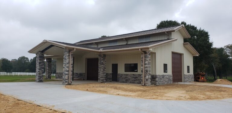 Urban Barn exterior view, Cypress, TX - Keeton Construction Services, showing covered entry with stone columns and metal roof