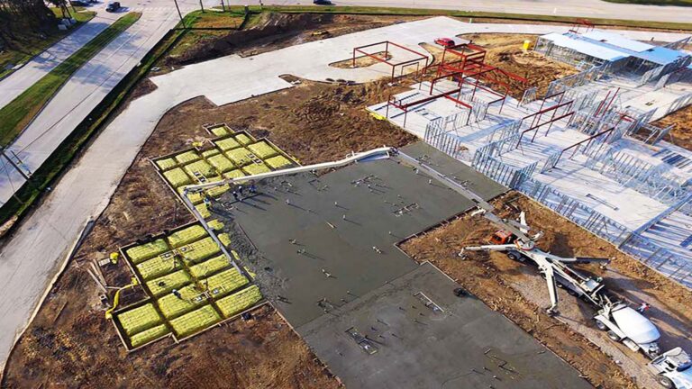 Aerial view of concrete work and structural framing during construction of Main Street Houston Transitional Care, Houston TX - Keeton Construction Services