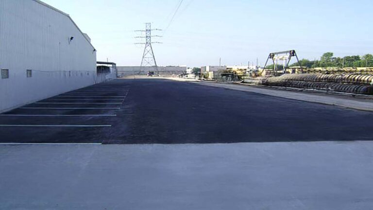 Paved parking area and yard alongside the Trelleborg Offshore Engineered Systems building in Houston, TX - Keeton Construction Services