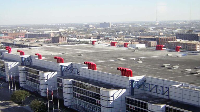 Elevated view of the George R Brown Convention Center roof in Houston, TX showing rooftop mechanical stacks, a Keeton Construction Services project