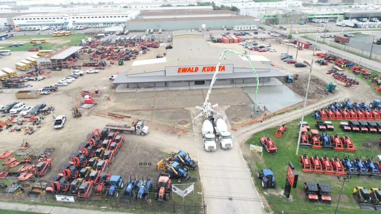 Ewald Kubota Equipment Dealership Houston TX - aerial view during construction with concrete trucks on site, by Keeton Construction Services