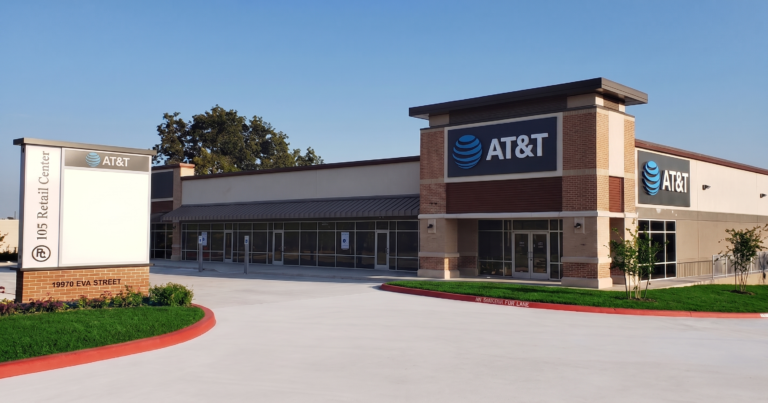 Exterior of the 105 Retail Center in Montgomery, TX, built by Keeton Construction Services, showing the building facade, monument sign, and parking area
