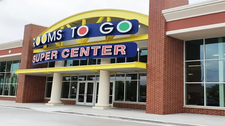 Rooms To Go Retail Center in Houston TX - Super Center entrance with arched canopy and storefront signage, Keeton Construction Services