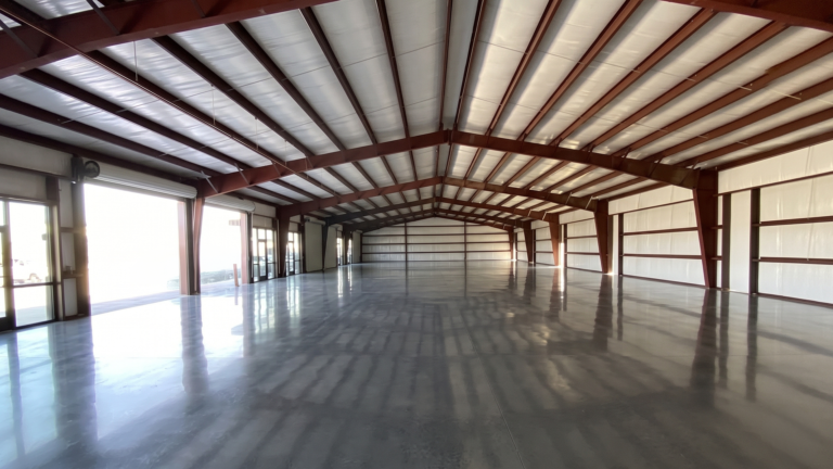 Interior of a warehouse bay at FM 529 Business Park Phase II in Katy TX showing open floor plan and structural framing by Keeton Construction Services