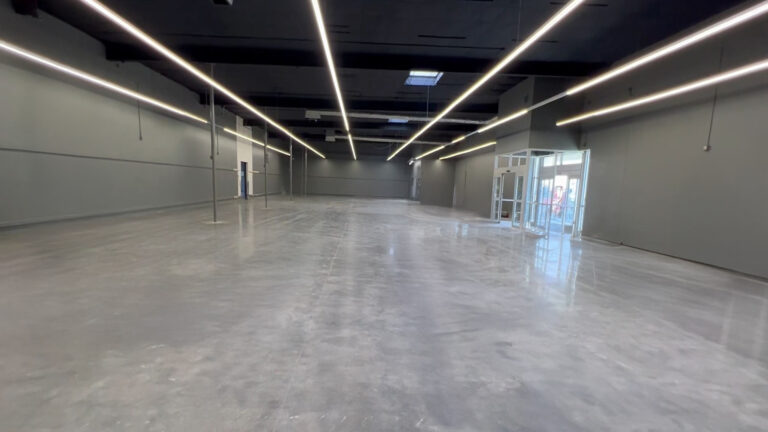 Harbor Freight Rosenberg, TX - empty interior space with linear lighting and entry doors, Keeton Construction Services