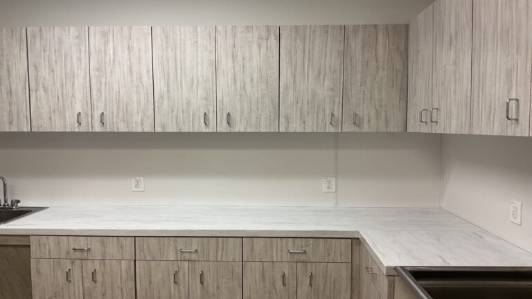 Interior cabinetry with upper and lower cabinets and countertop at Prescolaire Early Learning Academy Spring, Keeton Construction Services, Spring, TX