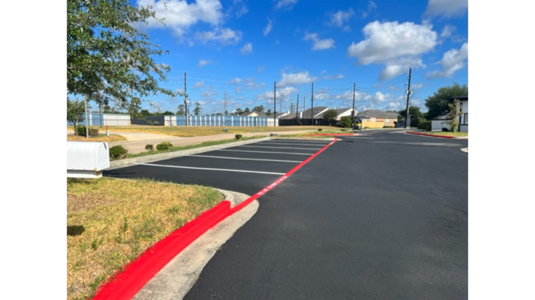 Paved parking area with striping and curbing at Prescolaire Early Learning Academy Spring, Keeton Construction Services, Spring, TX