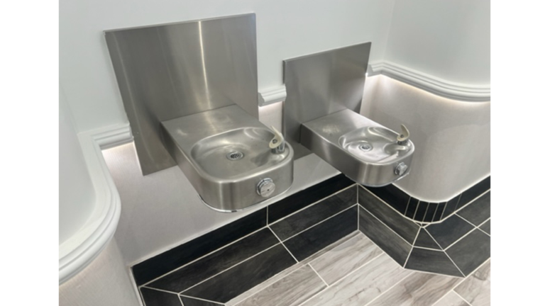 Dual wall-mounted drinking fountains at different heights at Prescolaire Early Learning Academy Spring, Keeton Construction Services, Spring, TX