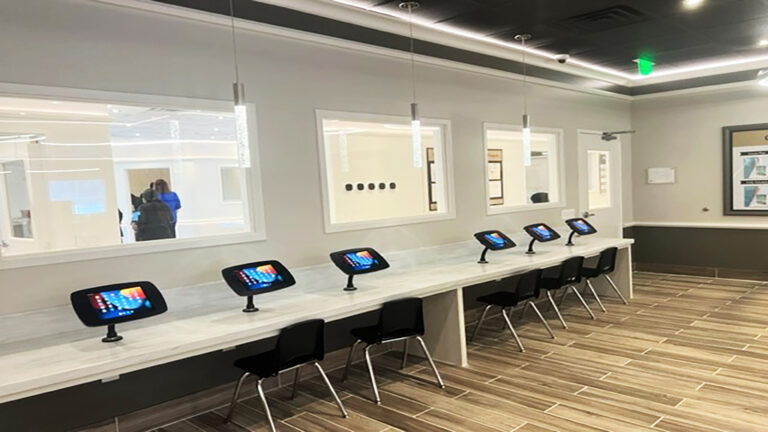 Interior room with tablet stations along a counter at Prescolaire Early Learning Academy Spring, Keeton Construction Services, Spring, TX