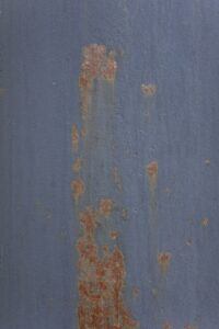 Rusty painted metal surface needs Houston commercial painting