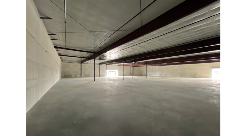 Interior of the Harbor Freight Baytown project by Keeton Construction Services showing an open retail space with structural framing overhead, Baytown, TX