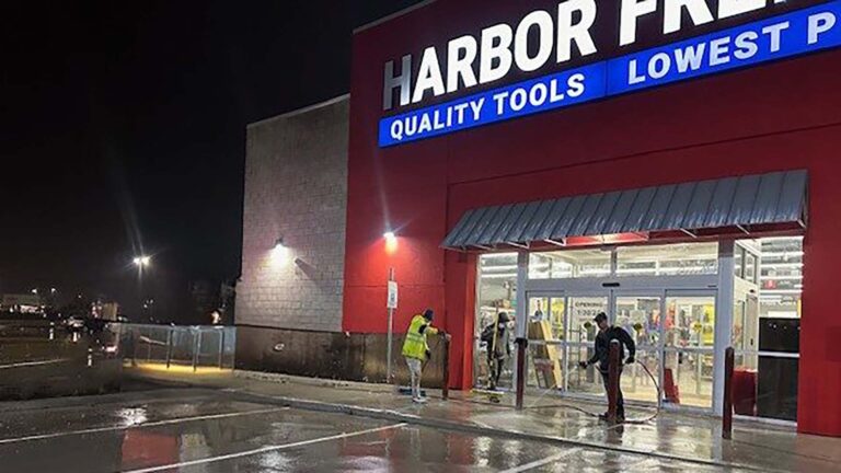 Harbor Freight Watauga entrance at night with workers at the storefront, by Keeton Construction Services, Watauga, TX