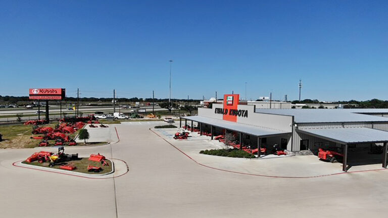 Ewald Kubota Equipment Dealership Rosenberg TX, exterior and lot with red equipment, Keeton Construction Services project
