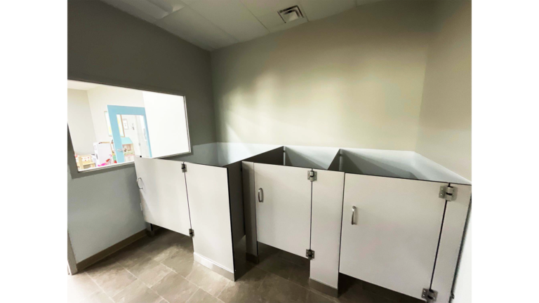 Little Texans Day Care Center interior restroom with toilet partitions, Conroe, TX - Keeton Construction Services