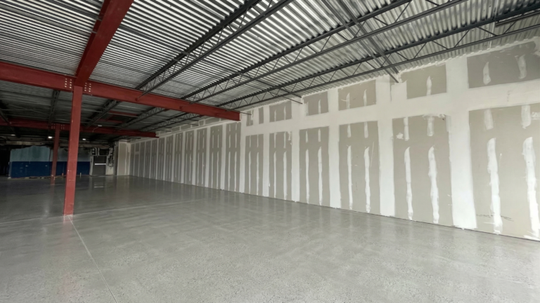 Interior of Fairmont Retail Center with open floor space and interior partition walls, Pasadena TX - Keeton Construction Services