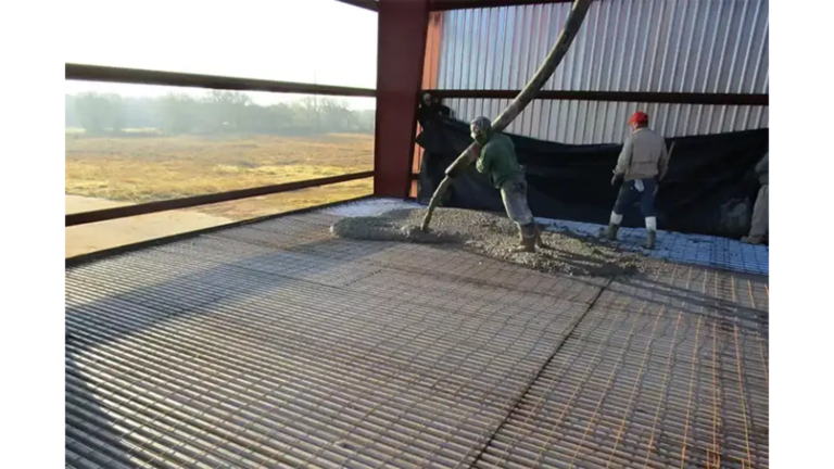 American Petroleum workers pouring a concrete slab during construction, Houston, TX - Keeton Construction Services