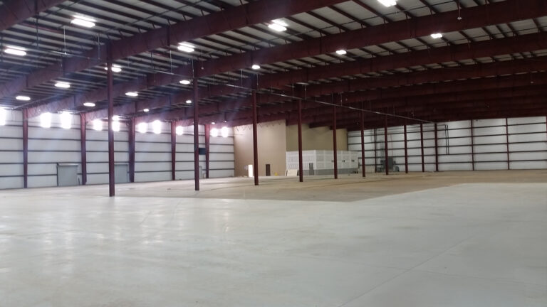 American Petroleum large enclosed interior space with overhead lighting, Houston, TX - Keeton Construction Services