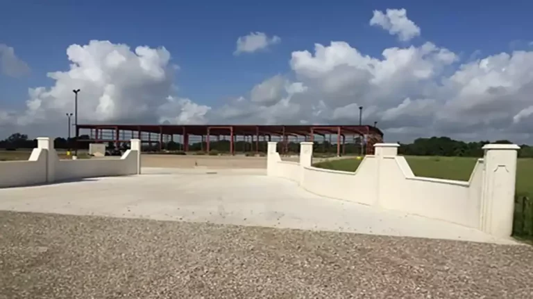 American Petroleum site entry area with perimeter wall and structural framing in background during construction, Houston, TX - Keeton Construction Services